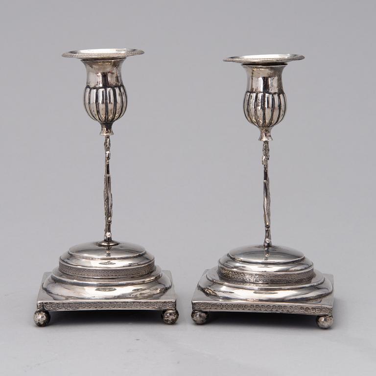 A PAIR OF FINNISH SILVER CANDLESTICKS, Wilhelm Fahlström 1818-1828, Helsinki.