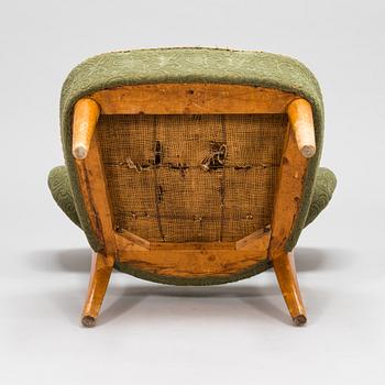 Lisa Johansson-Pape, a 1940's armchair for  Keravan Puusepäntehdas, Stockmann.