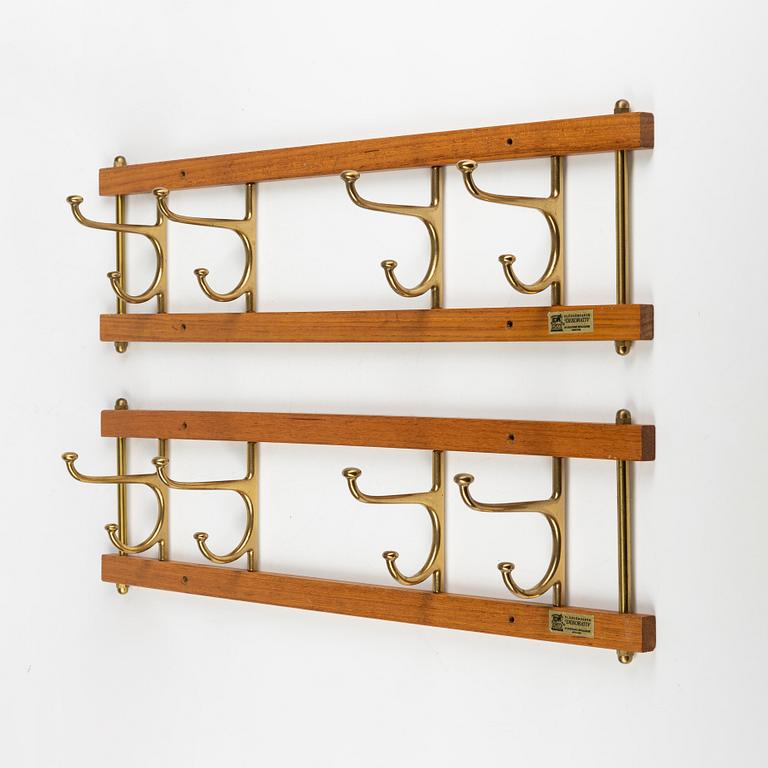 A pair of 'Dekorativ' teak coat hangers, Skoglunds metallgjuteri, Anderstorp, 1950's/60's.