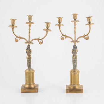 A pair of Empire style candelabra, around 1900.