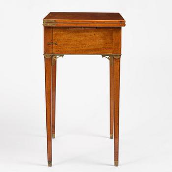 A late Gustavian mahogany games table, presumably by A. Nordström (Journeyman at G. Iwersson 1806-09).