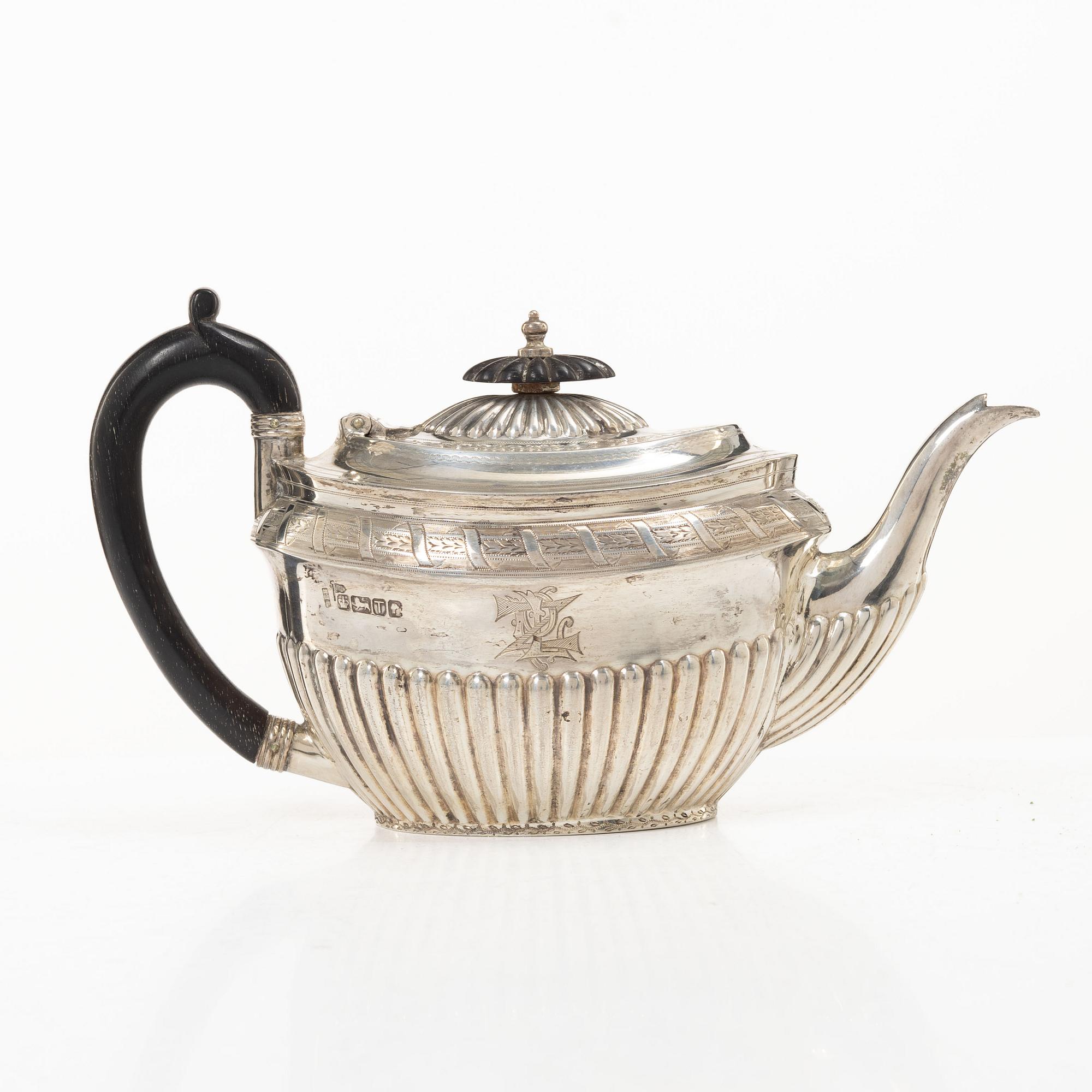 An English silver teapot, mark of Walker & Hall (John Edward Bingham), Sheffield, 1886.