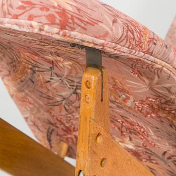 Ilmari Tapiovaara, an early 1960s 'Dolphin chair' for Skanno.