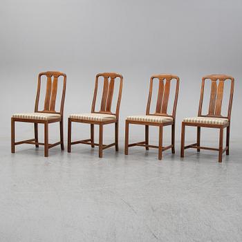Carl Malmsten, A five-piece walnut 'Ambassadör' dining suite by Carl Malmsten.