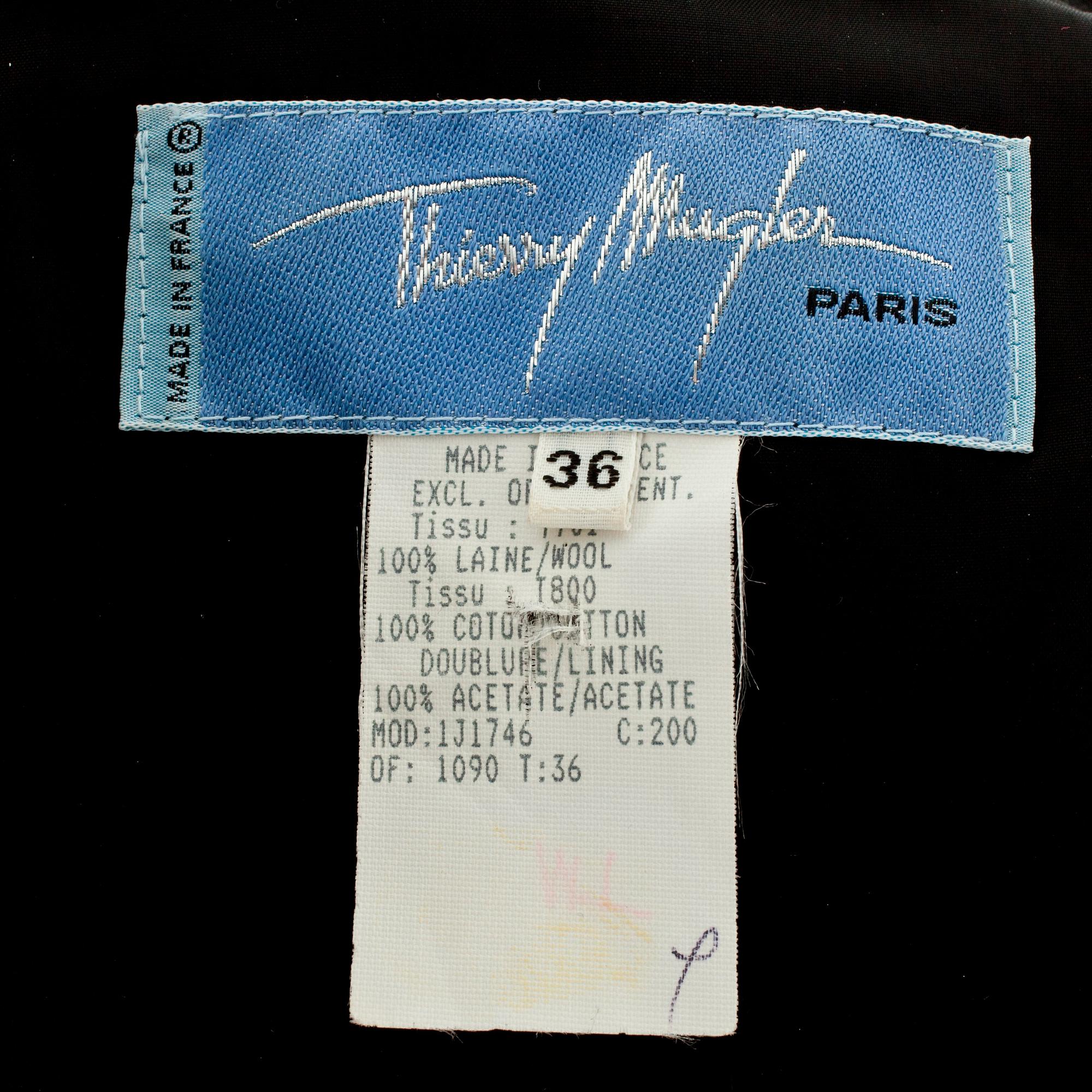 THIERRY MUGLER, a two-piece black wool and velvet dress consisting of jacket and skirt.