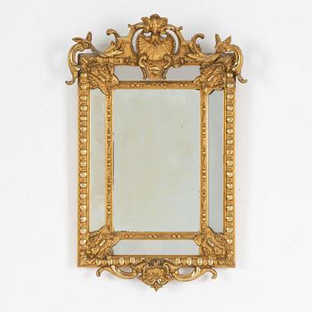 A Baroque style mirror, early 20th Century.