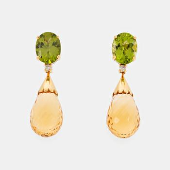 1071. A pair of 18K gold earrings set with faceted peridots and with briolette-cut citrines.