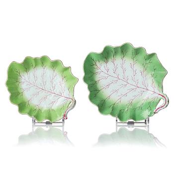 1309. A pair of leaf shaped 'European subject' dishes, Qing dynasty, 18th century.