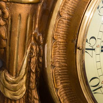 A wall clock in gustavian style, marked Rob. Engström, Stockholm, mid 20th century.