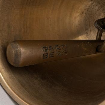 Bertel Gardberg, a brass and teak table clock, marked Gardberg Finland.