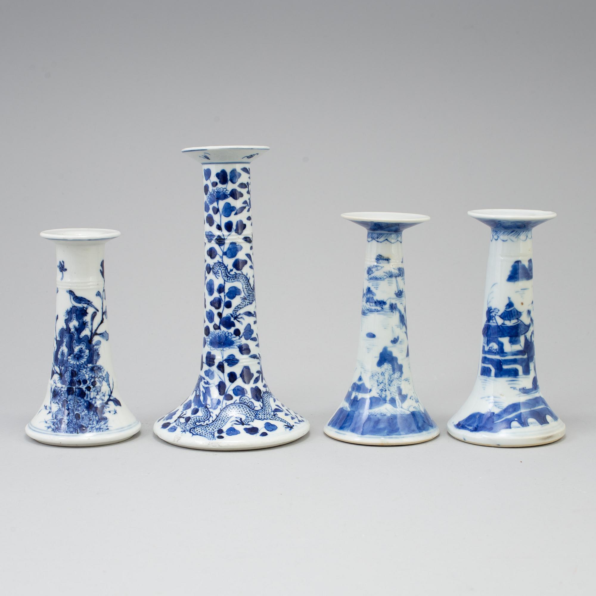 Four chinese 19th century blue and white porcelain candle holders. Qing dynasty.