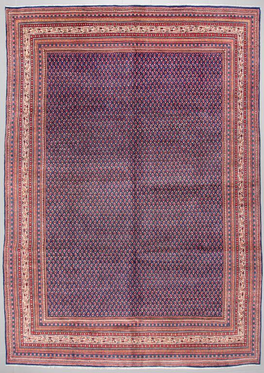 A Sarouk rug, 393 x 284 cm.