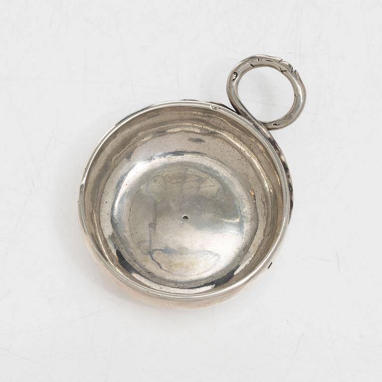 A French silver tastevin, mid-19th Century.
