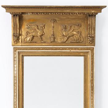 An Empire Mirror, early 19th Century.