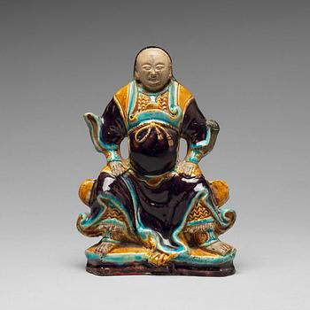 A ceramic figure of the warlord Guan Yu, Ming dynastin (1368-1644).