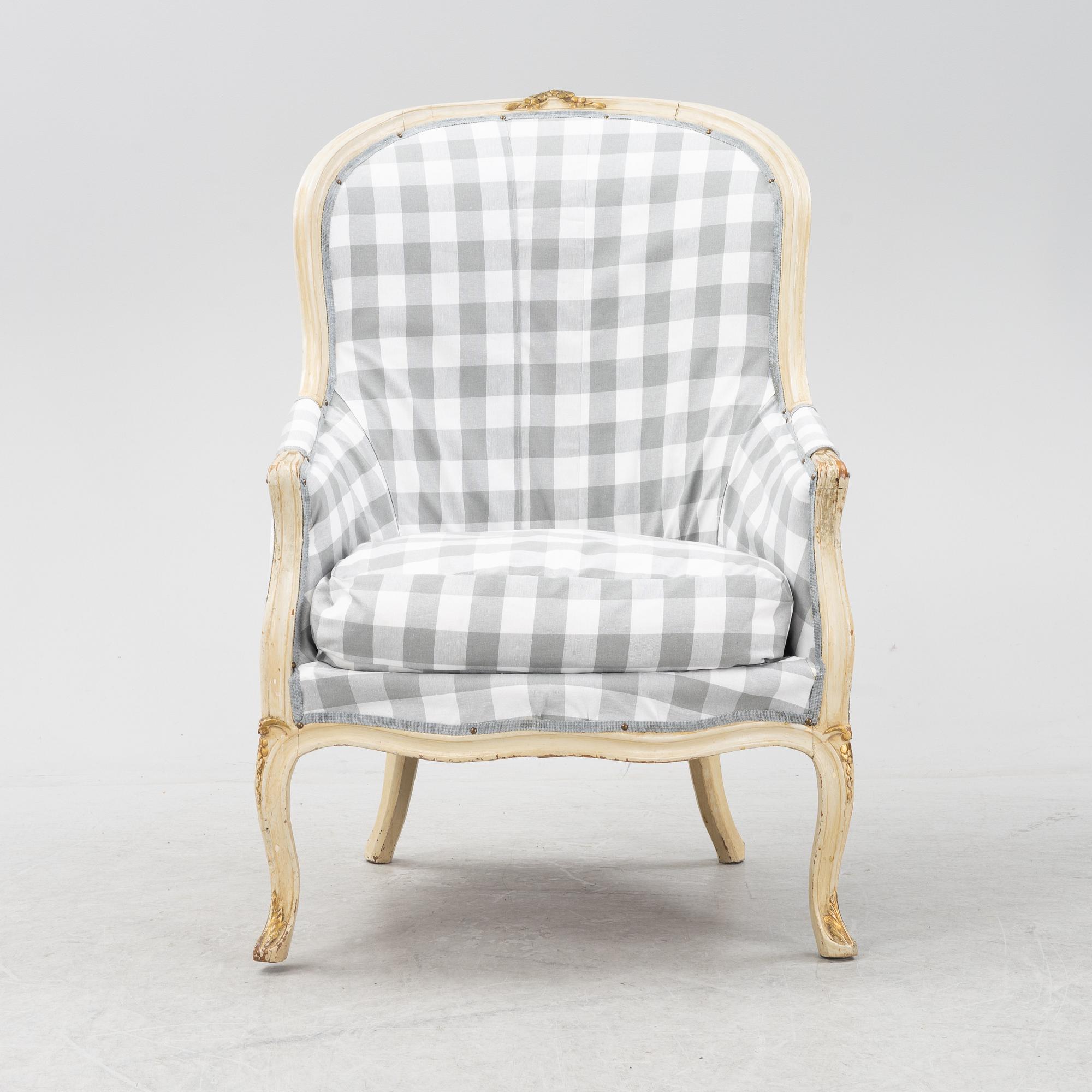 A Rococo-Style Bergère Easy Chair, first half of the 20th century.