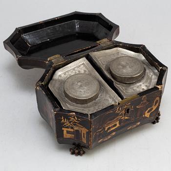 A Chinese tin case in a wooden box, early 20th century.