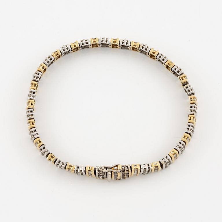 Bracelet, 14K gold with brilliant- and baguette-cut diamonds.