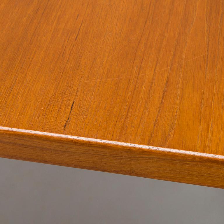 A mid-20th century dining table.