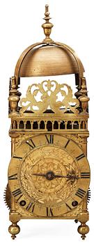 An English middle 17th century brass lantern clock signed Thomas Loomes At The Mermayd In Lothbury.