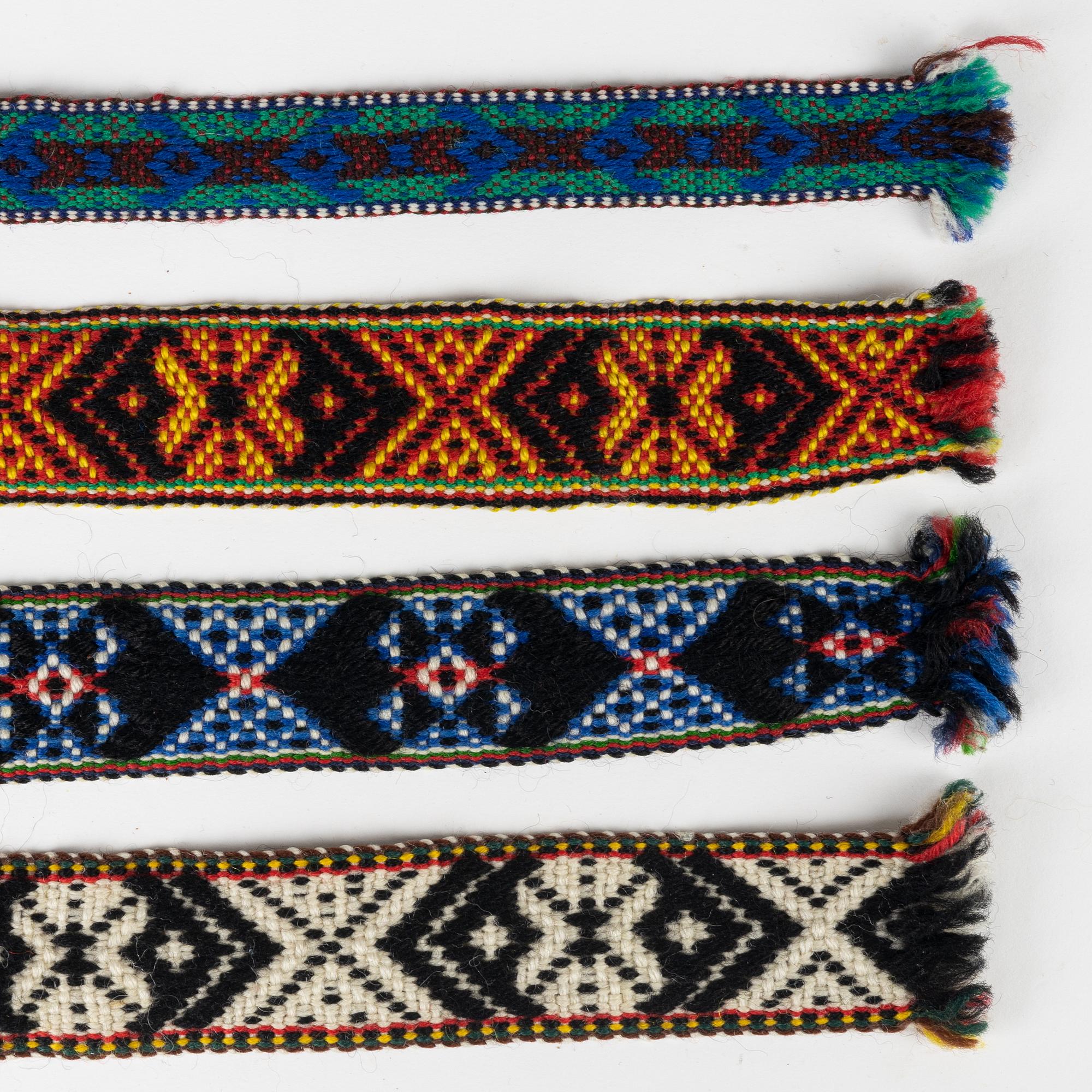 Twelve woven multicoloured bands, 20th Century.