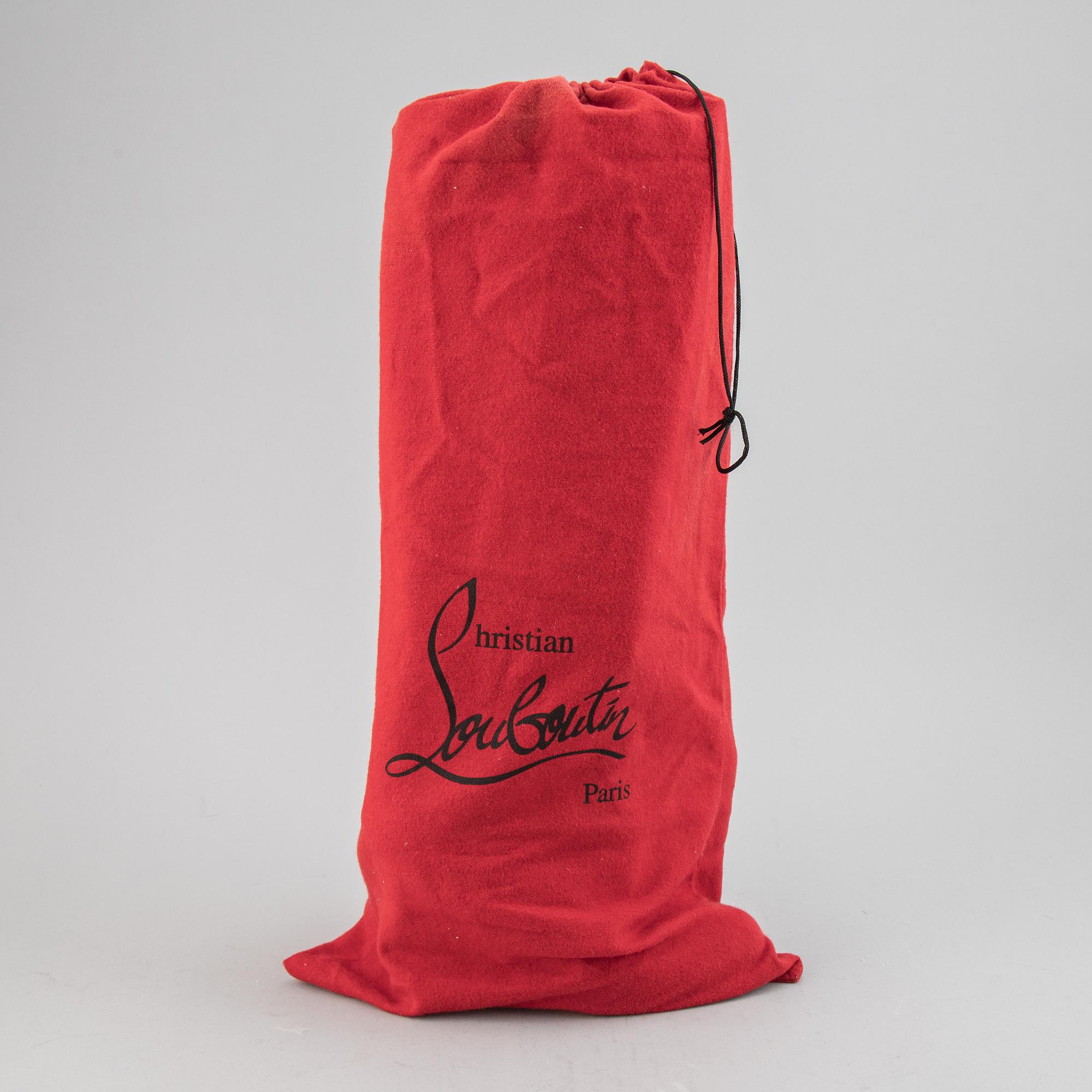 CHRISTIAN LOUBOUTIN, a pair of leather boots, size 37.