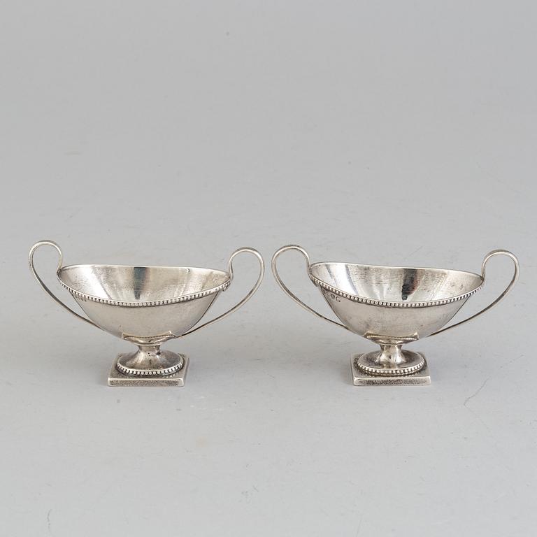 a pair of silver salt cellars, London, 1877.