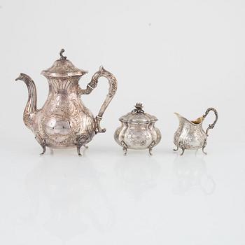 A Swedish silver coffee pot, sugarbowl and a creamer, including Sven Carlsson, Stiltenn, Stockholm 1968.