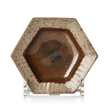 175. Tatsuzō Shimaoka, an hexagonal stoneware dish, Japan, 1960s.