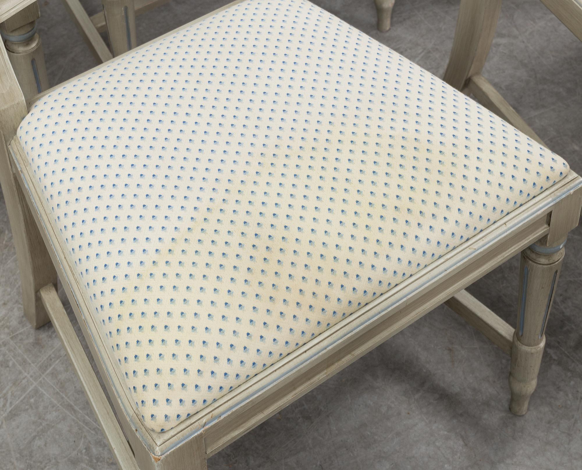 A dining table and six chairs, Gustavian style, second half of the 20th century. One leaf included.
