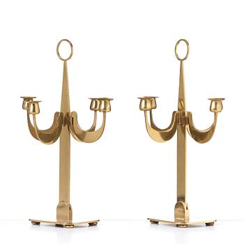 Josef Frank, a pair of brass candelabra by Svenskt Tenn, Sweden 1950's, model nr 2663.