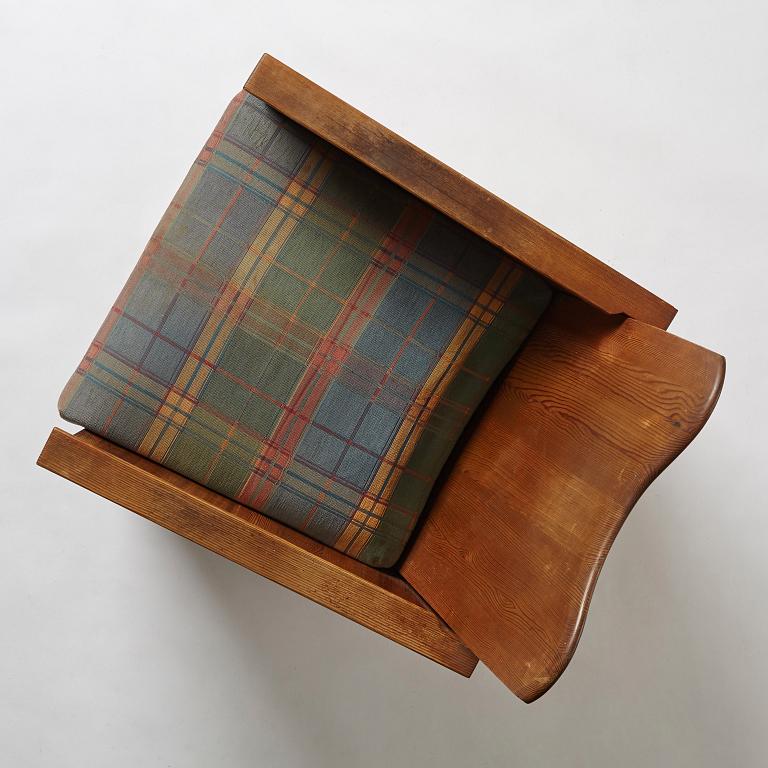 Axel Einar Hjorth, a stained pine easy chair "Utö", Nordiska Kompaniet, Sweden 1930's.