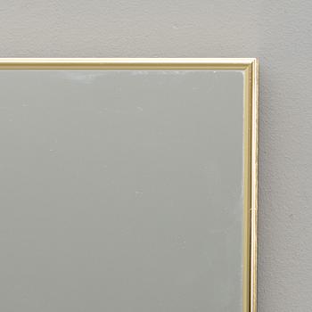 A WALL BRASS MIRROR. SECOND HALF OF 20TH CENTURY.