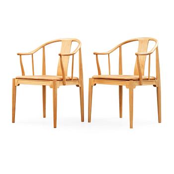 124. A pair of Hans J Wegner 'China chairs', Fritz Hansen, Denmark 1986-87.
