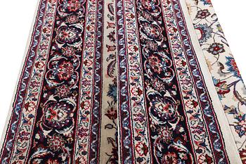 A carpet, Sarouk, part silk, c. 294 x 167 cm.