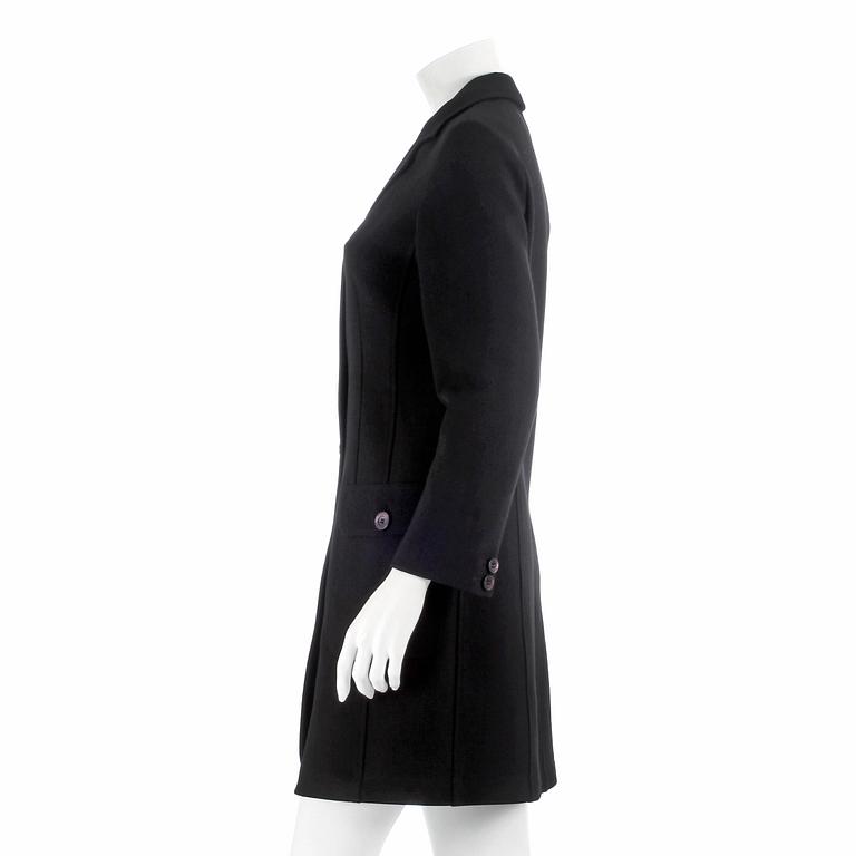 MOSCHINO, a black blendmaterial coat from the 1990s. Italian size 42.