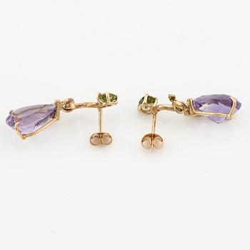 Earrings with drop-shaped faceted amethysts, peridot, and small diamonds.