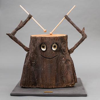 A drumming tree stump made by JoAnn Tan Studio for NK 2016.