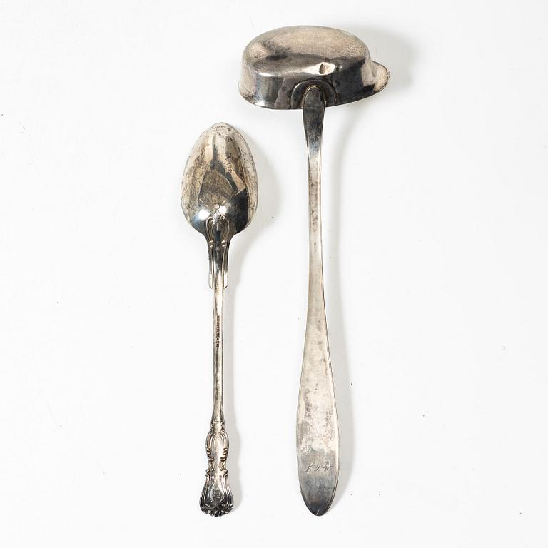 A Swedish silver soup ladle and a serving spoon, 19th Century.