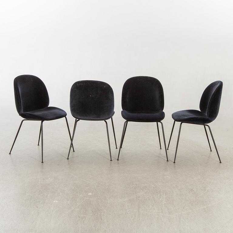 A set of four Beetle dining chairs by Gamfratesi for Gubi 2013.