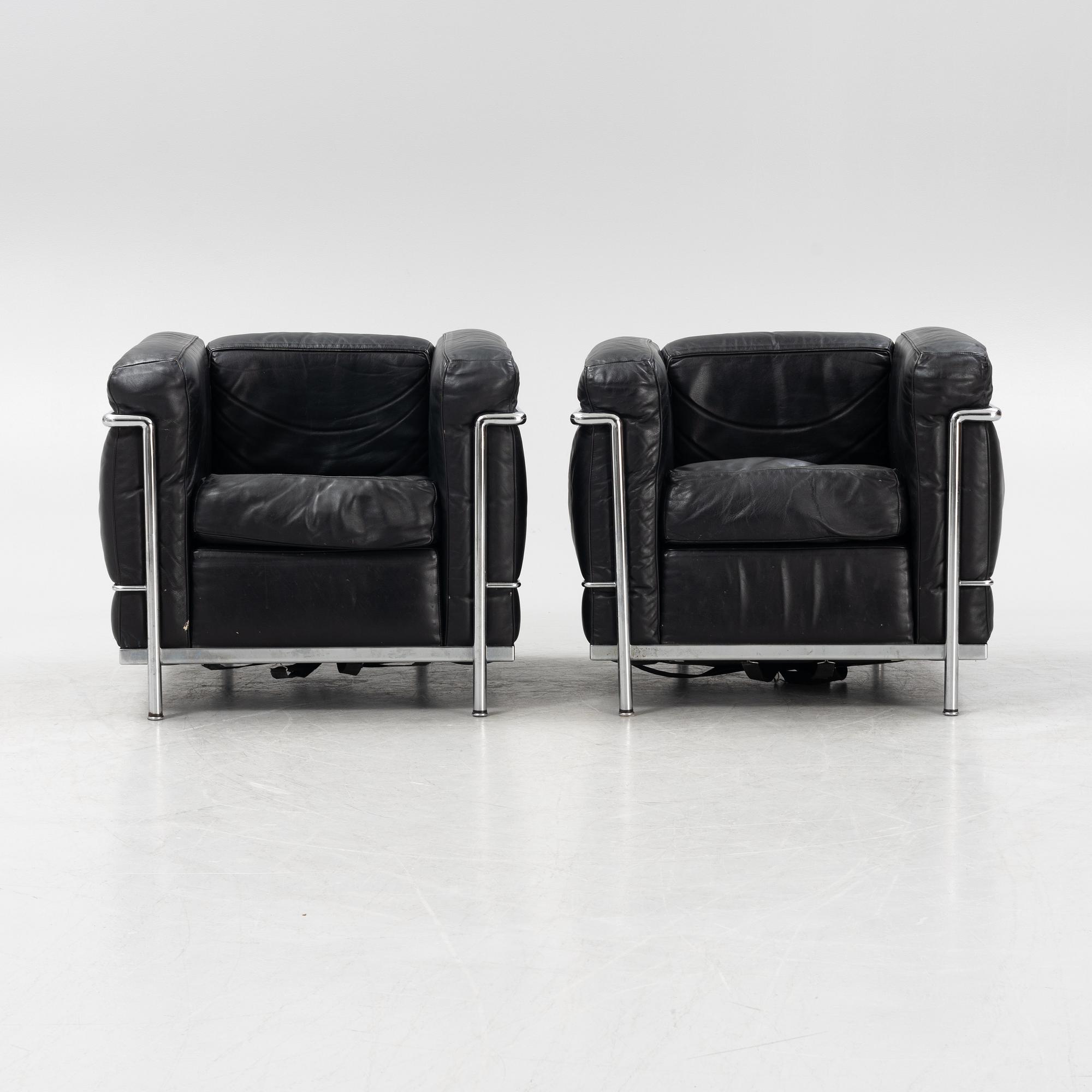 Le Corbusier, Pierre Jeanneret & Charlotte Perriand, a pair of 'LC2' easy chairs, Cassina.