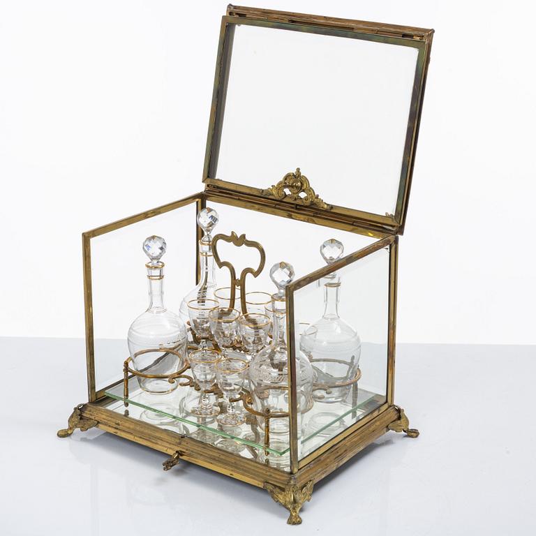 Liqueur set, glass and brass, first half of the 20th century.