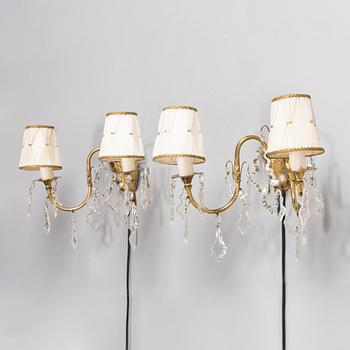 Mauri Almari, a pair of mid-20th-century brass wall sconces for Idman.
