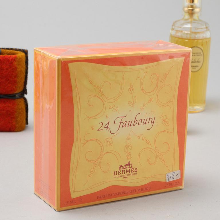 HERMÈS, seven factices and one perfumebottle.