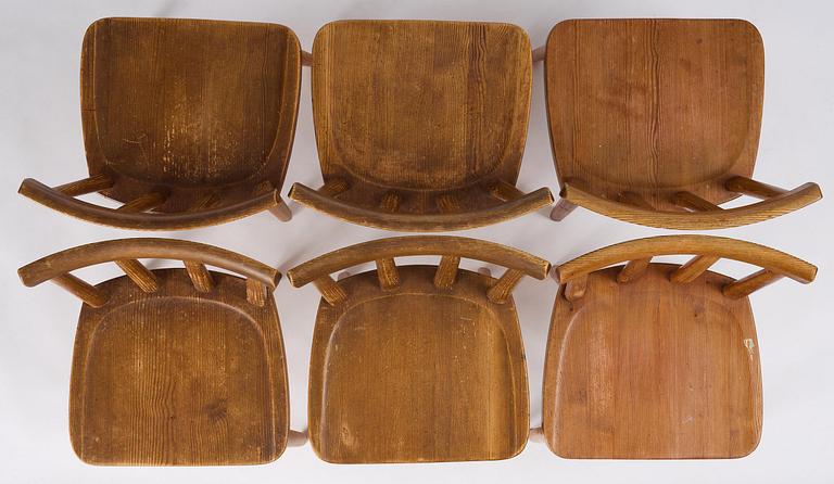 Axel Einar Hjorth, a set of six stained pine "Utö" chairs, Nordiska Kompaniet, Sweden, 1930s.