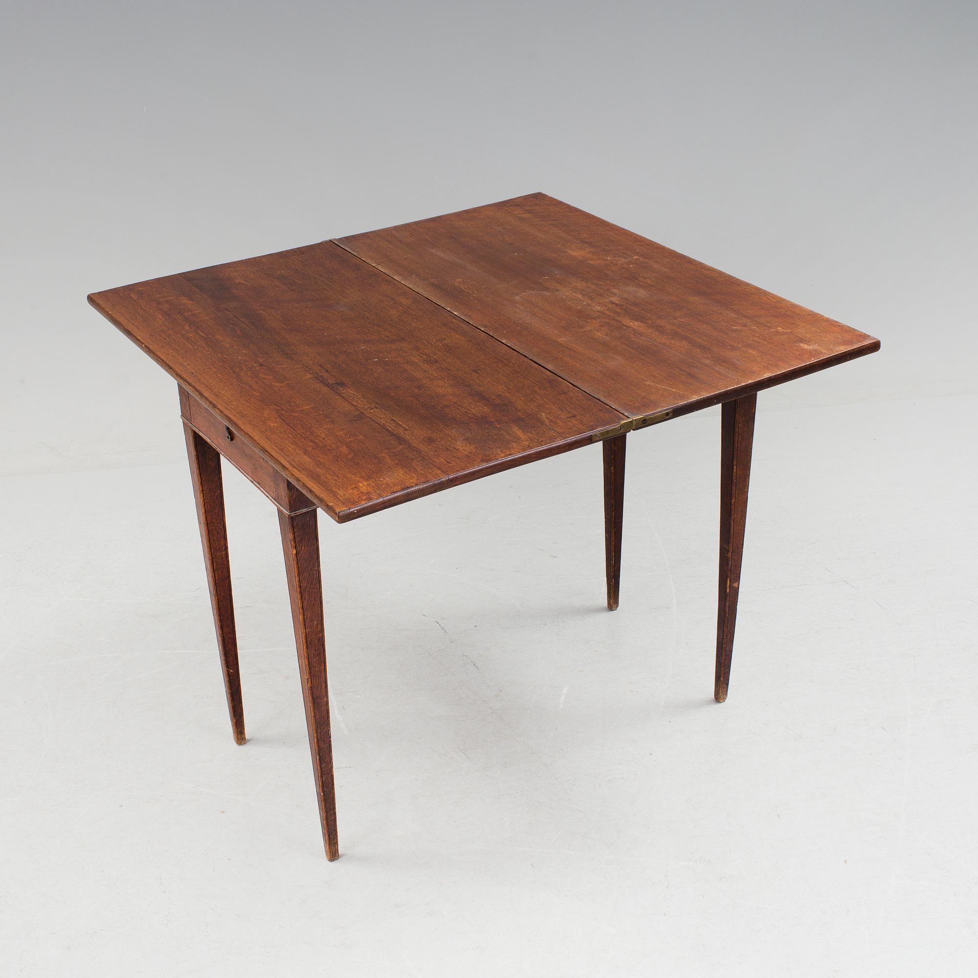 A late gustavian table by Jonas Lidströmer. Signed and dated 1779.