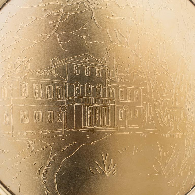 12 brass plates from Skultuna, late 20th century.