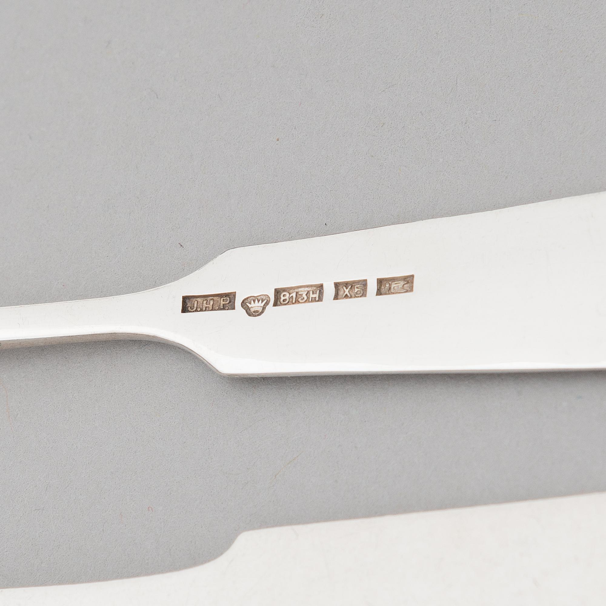 A 42-piece set of silver cutlery with seashell decorated handles, Finnish hallmarks, 1918-1950.