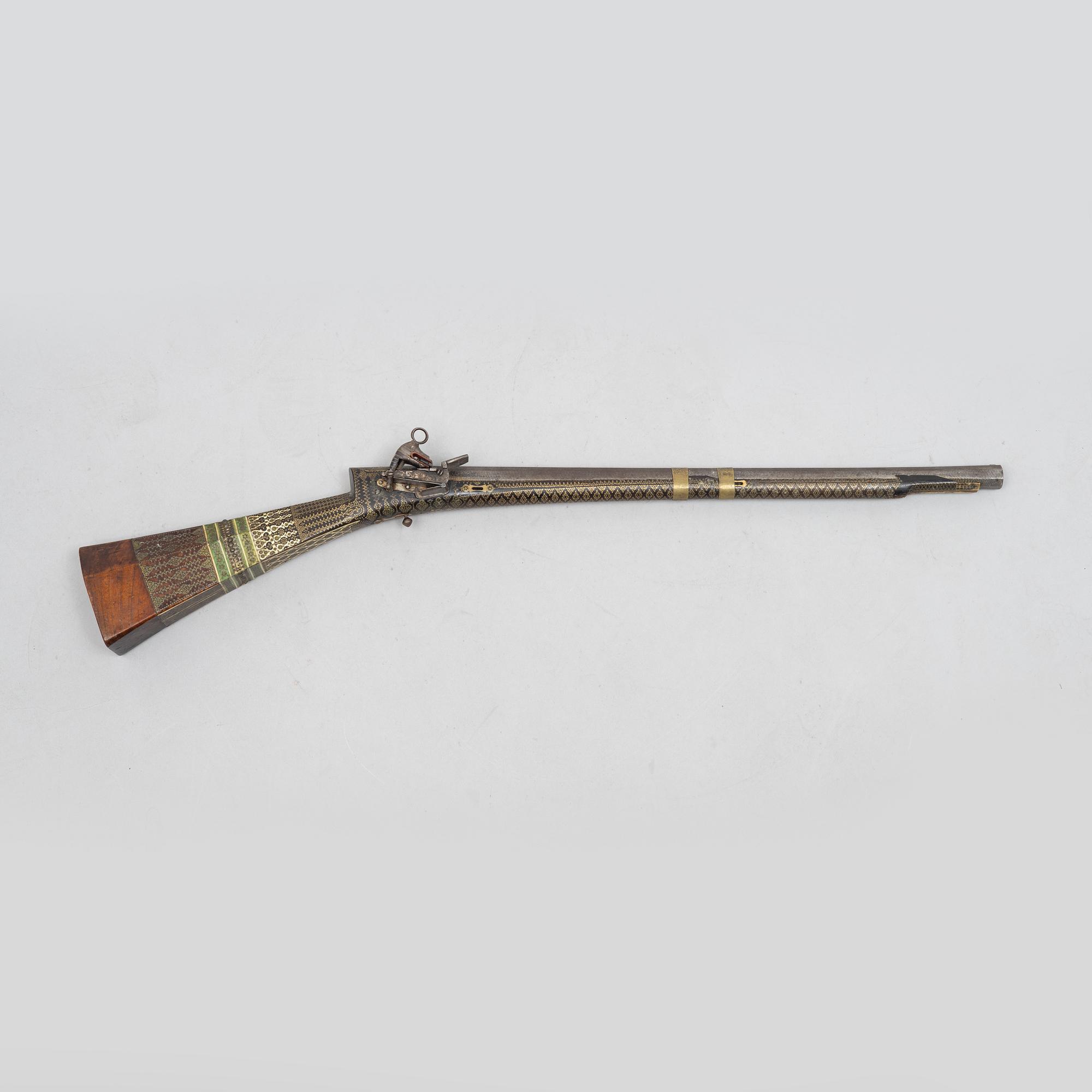 A Persian snaphaunce rifle, 18th century.