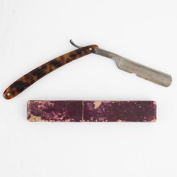 An early 19th century mahogny-veneered box for shaving utensils.